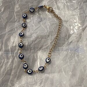 Chic Gold Bracelet with Blue Evil Eye Beads